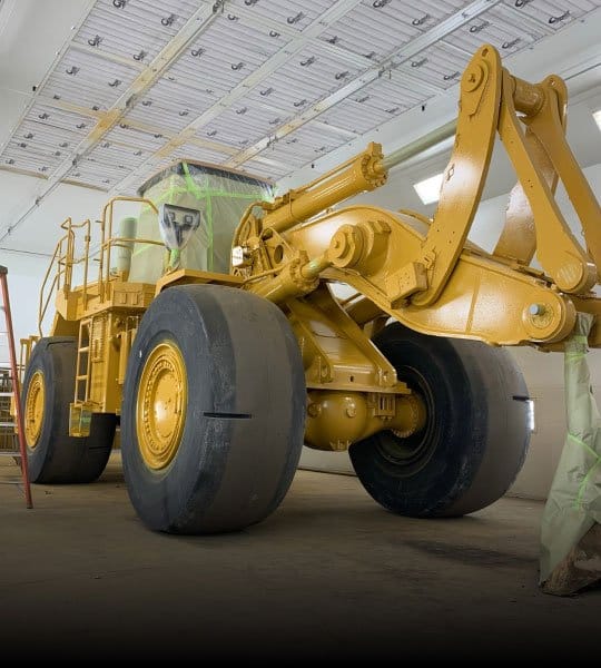 Rebuilt heavy equipment in the Bulk paint booth