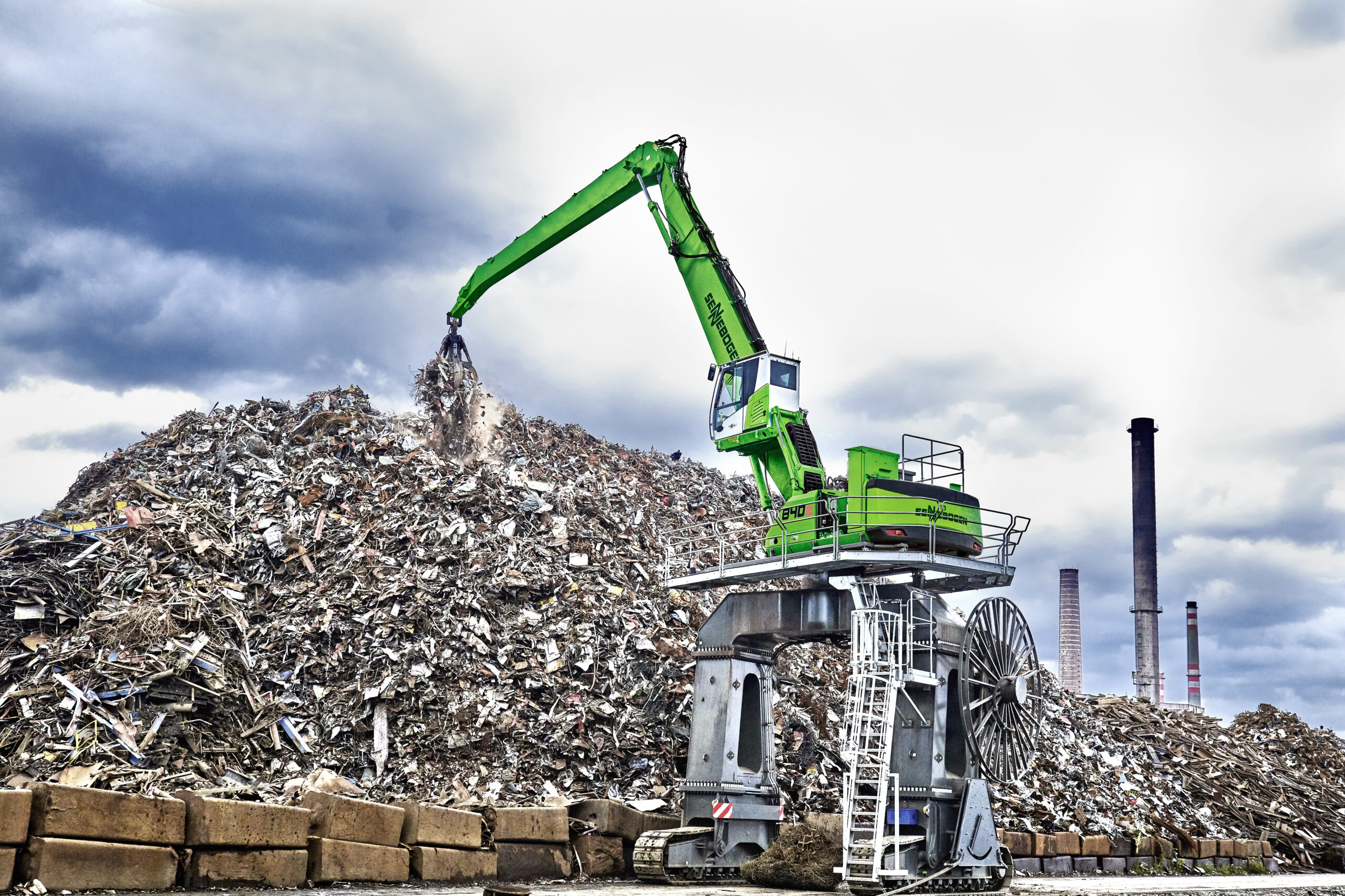 Material handler working in a scrap and metals yard
