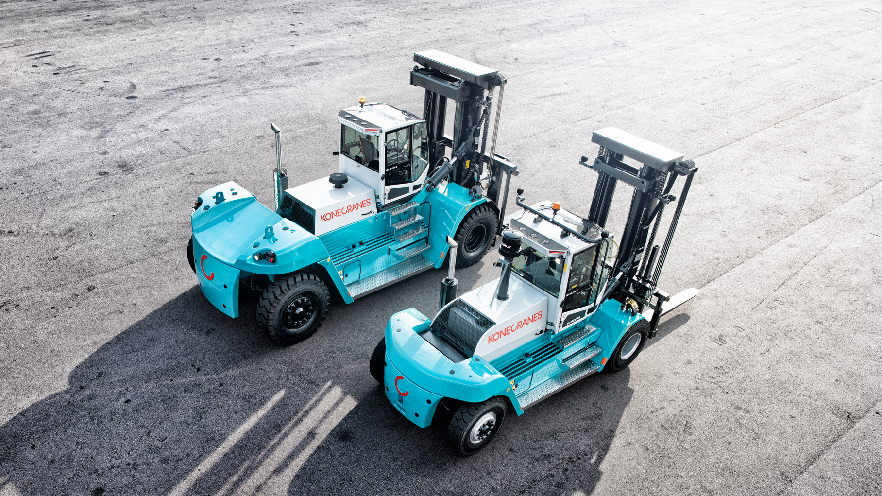 Heavy-capacity lift trucks lined up and ready to work