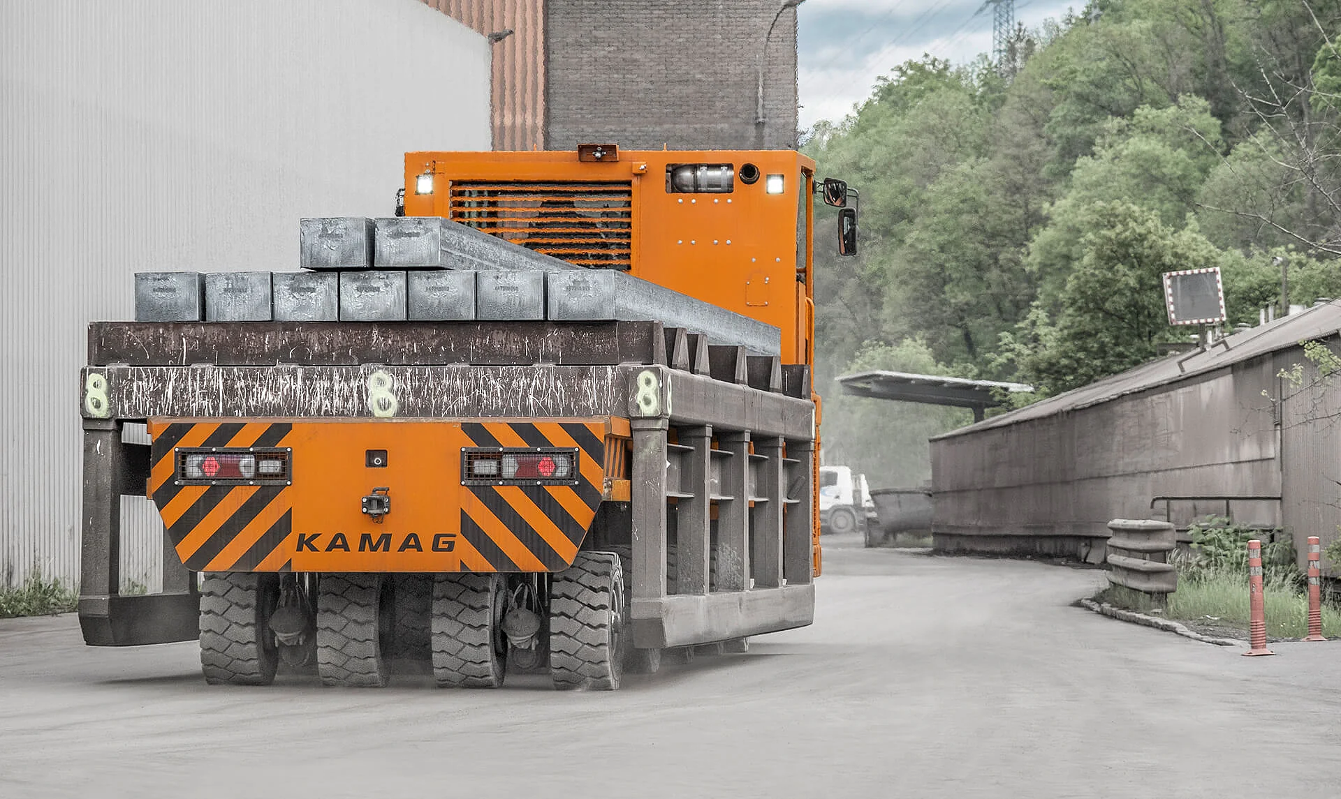 KAMAG industrial heavy transporter hauling steel