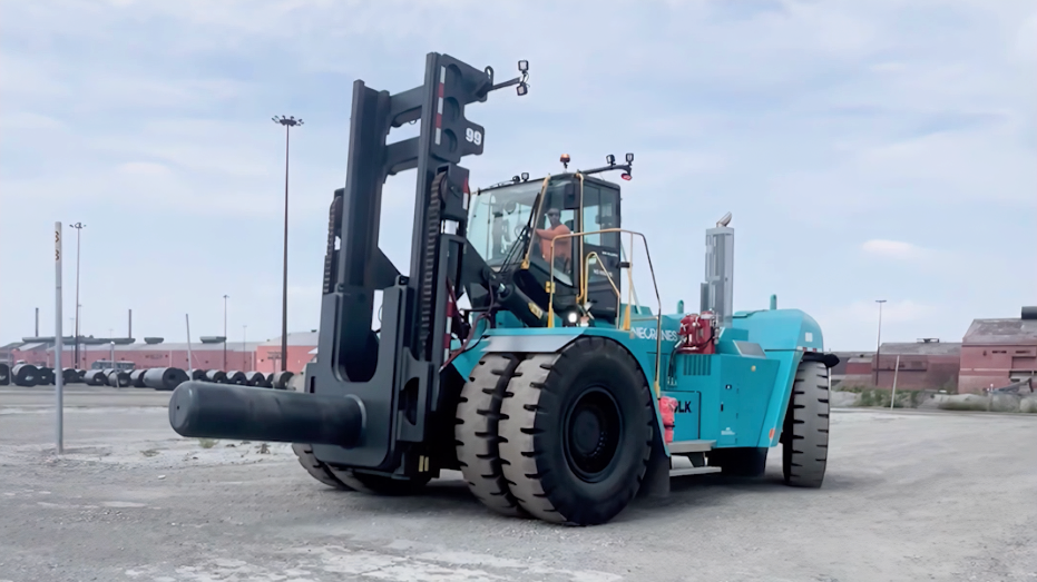 Kona Cranes Forklift with Coil Ram Attachment at Steel Mill